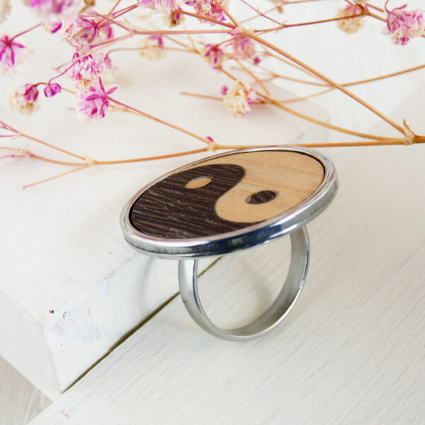 lose-up of the inner part of the adjustable wooden yin yang ring