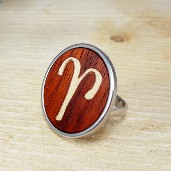 Aries horoscope ring made with natural wood inlay and a steel base