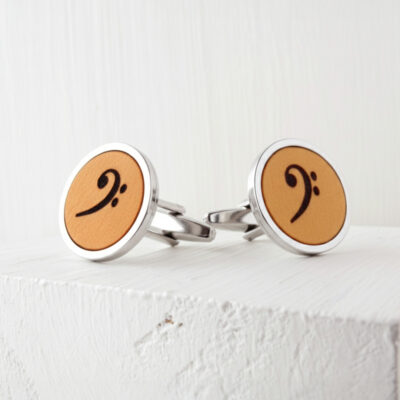 Bass player cufflinks wooden design featuring an engraved bass clef symbol