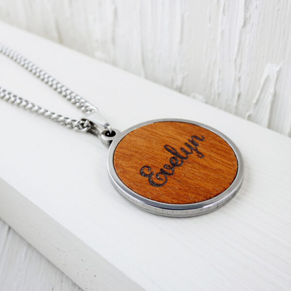 Custom wood necklace engraved with name in elegant script