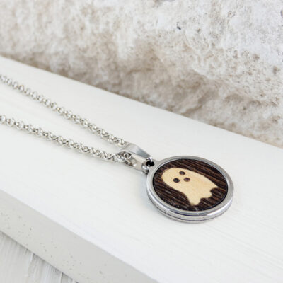 Ghost face pendant made of wenge and sycamore woods