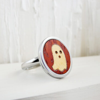 Ghost wood ring made from red padauk and stainless steel