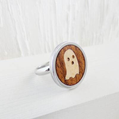 Handmade ghost ring with walnut base and stainless steel band