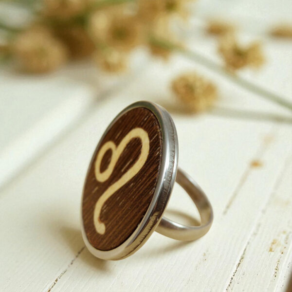 Handmade Leo zodiac ring with wood inlay and steel base