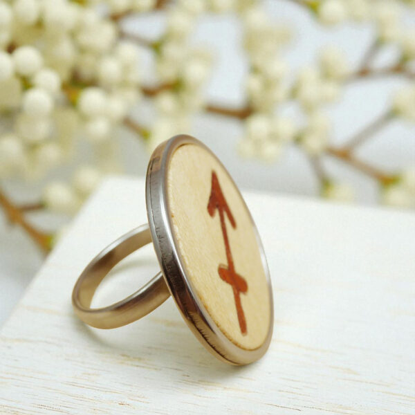 Handmade jewelry ring with Sagittarius arrow symbol in wood
