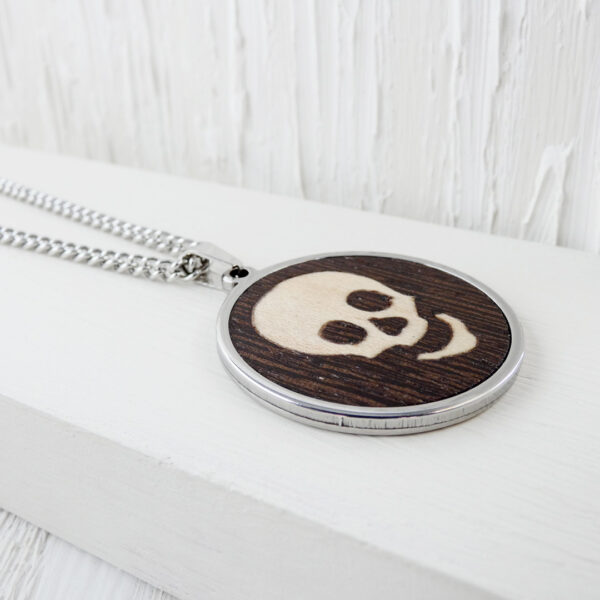 Handmade skull necklace with wood inlay and stainless steel base