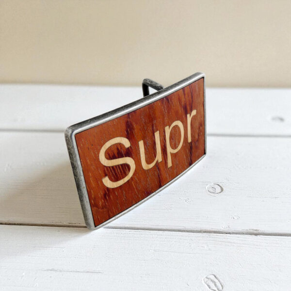 Handcrafted wood belt buckle with metal base and keyboard design