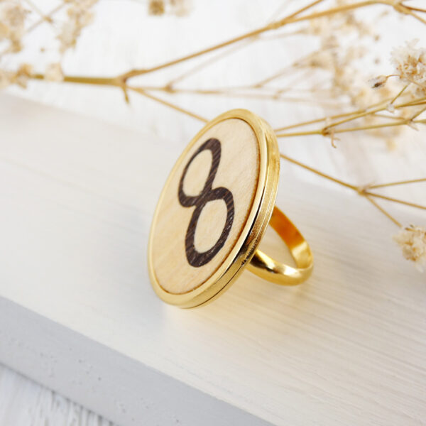 Infinity mothers ring with sycamore and wenge wood in gold-plated finish