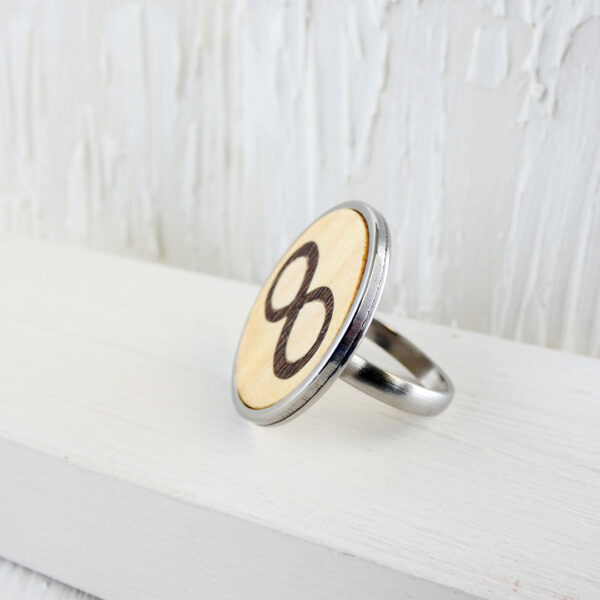 Infinity rings for her with sycamore and wenge wood in stainless steel