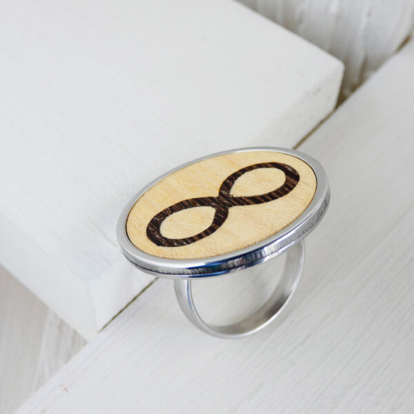 Infinity symbol ring in sycamore with wenge wood inlay and stainless steel