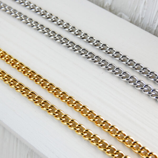 lose-up of stainless steel and gold-plated chains for jewelry