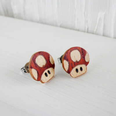 Handmade Mario mushroom earrings crafted using coral and sycamore wood marquetry