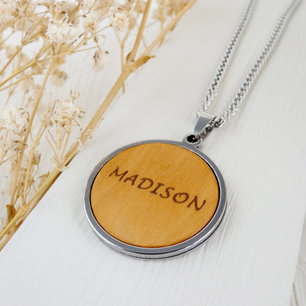 Engraved wooden jewelry pendant with personalized name