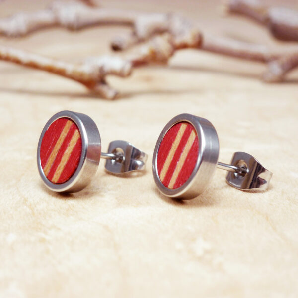 Bold small post earrings in red-dyed wood with sycamore stripes