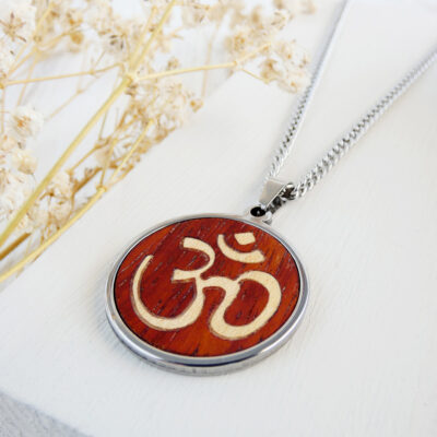 Sacred symbol necklace handmade with natural wood and polished metal finish