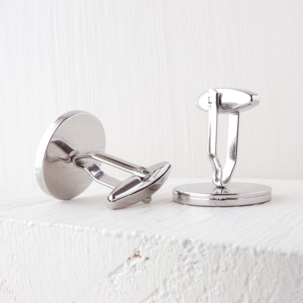 Stainless steel base detail of handcrafted wooden cufflinks