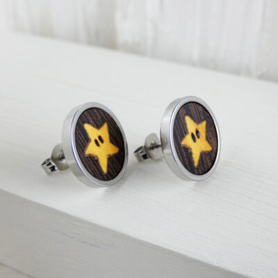 Handmade Super Mario star earrings featuring wood marquetry