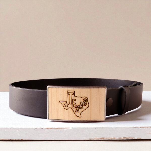 Engraved wooden Texas belt buckle shown on belt