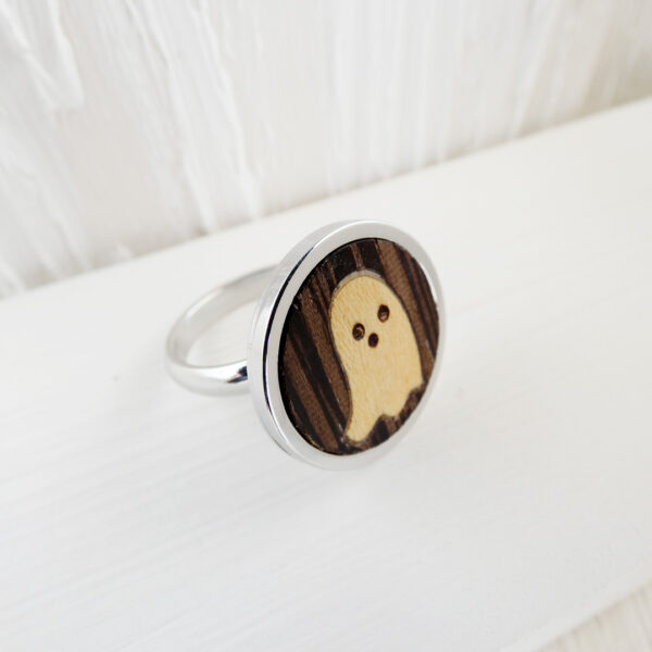 Unique stainless steel ghost ring with wenge wood base