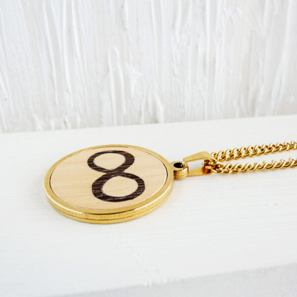 Women’s infinity necklace with sycamore and wenge wood in gold finish