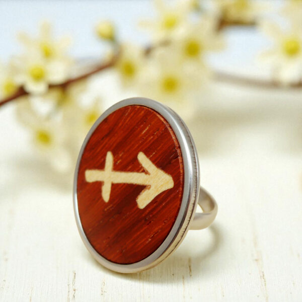 Women’s zodiac ring with Sagittarius symbol in wood and steel