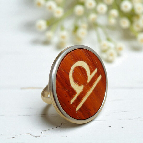 Wood and steel zodiac ring featuring the Libra sign
