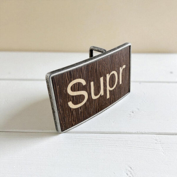 Wooden belt buckle featuring a handcrafted keyboard key design