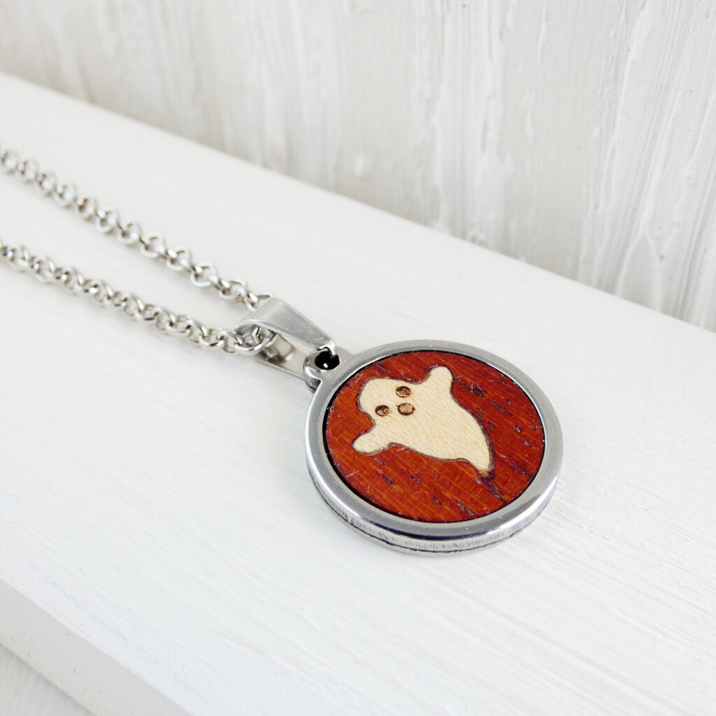 Wooden ghost necklace handmade with padauk and sycamore wood