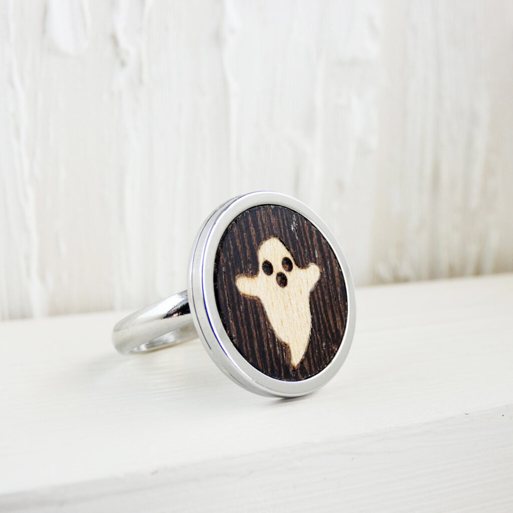Wooden ghost ring made of sycamore and wenge with a stainless steel adjustable band