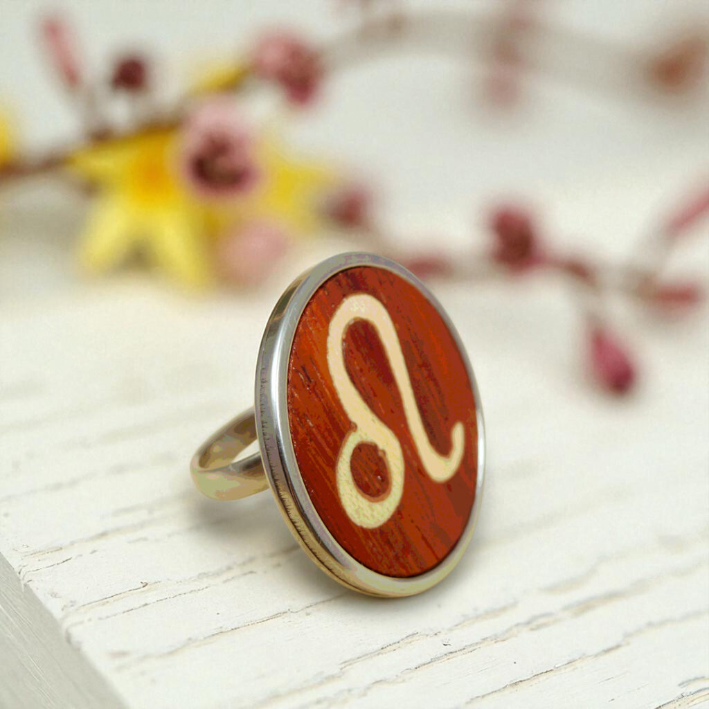 Wooden Leo ring with handmade zodiac symbol and stainless steel base