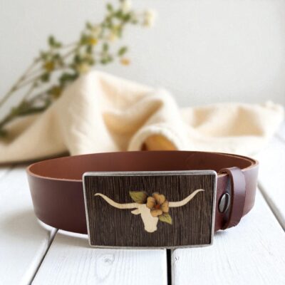 Wooden longhorn belt buckle with leather strap, floral marquetry design