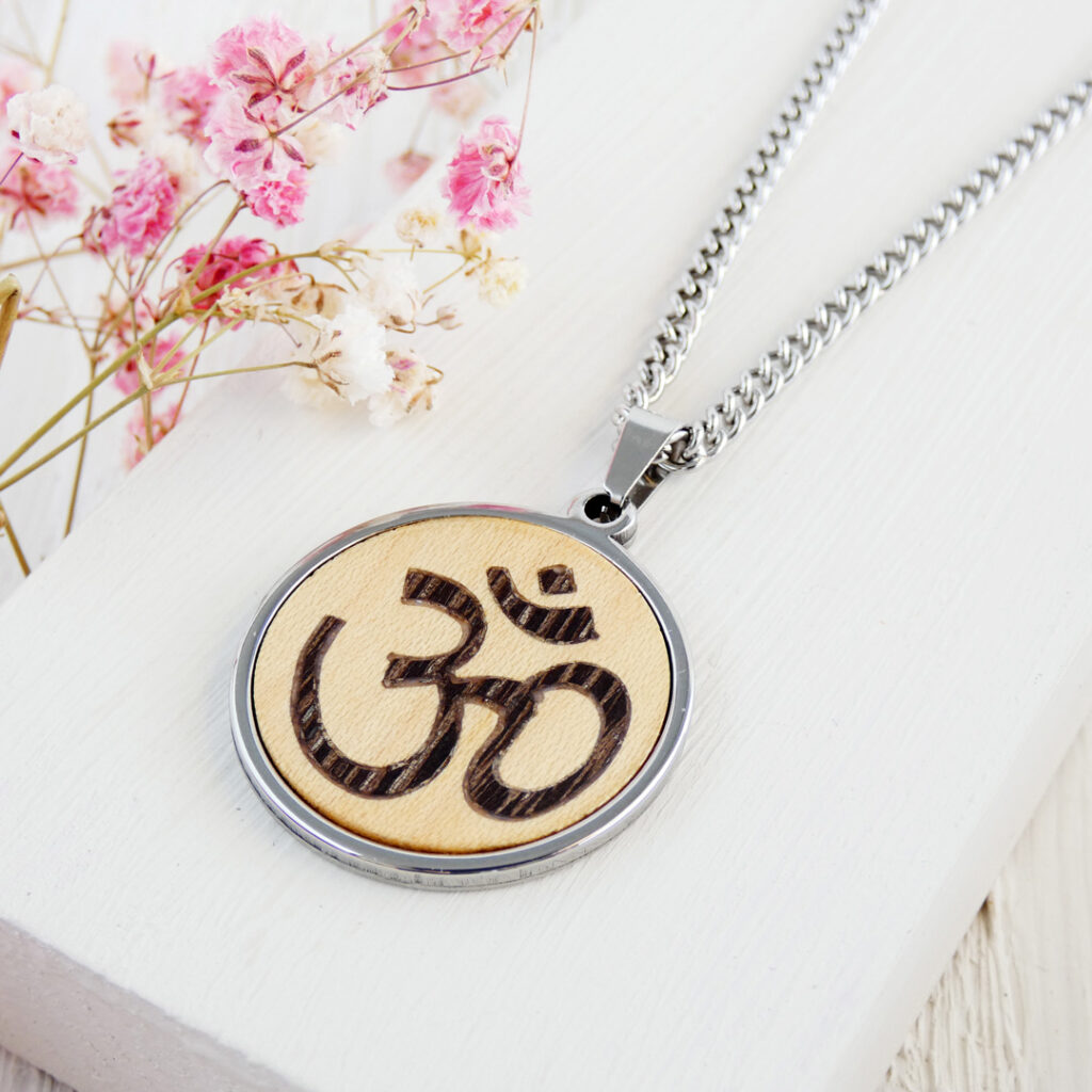Wooden Om necklace handmade with natural wood inlay and stainless steel finish