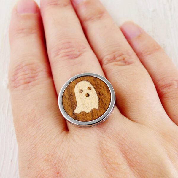 Wooden ring for women featuring a ghost inlay in walnut wood